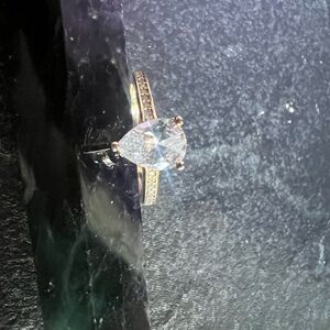 Hallmarked 925 rose gold tear drop ring .